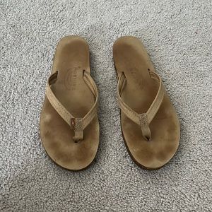 G. Used Tan Rainbow Flip Flops